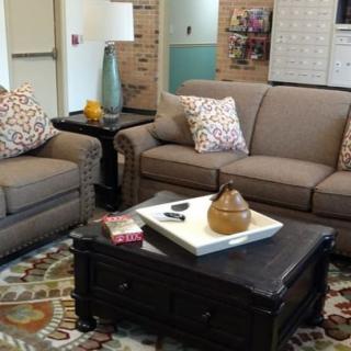 A cozy living room setup with comfortable seating and stylish decor.