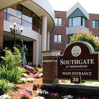 The main entrance of Southgate at Shrewsbury, featuring well-maintained landscaping and a prominent sign.