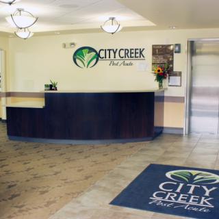 City Creek facility reception with branded decor and a welcoming front desk.