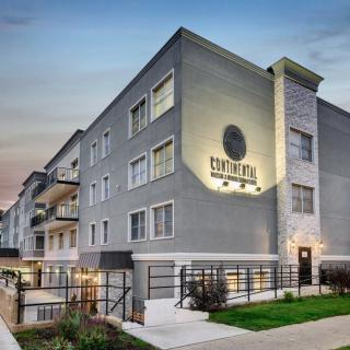 Modern apartment building exterior with sleek design.