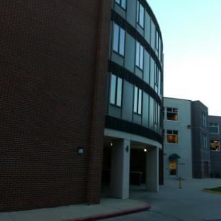 A view of a modern building showcasing unique architectural features.