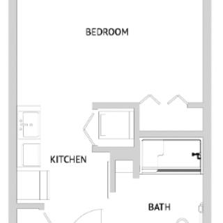 A simple floor plan showing a bedroom, kitchen, and bathroom layout.