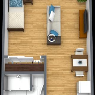 A cozy one-bedroom apartment floor plan with a living room, kitchen, dining area, and bedroom.
