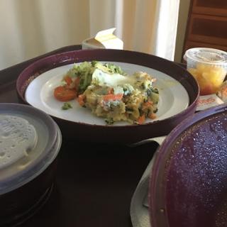 A colorful and healthy meal served on a plate, accompanied by a dessert.