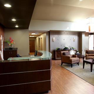 A welcoming lobby featuring modern furniture and a cozy waiting area.
