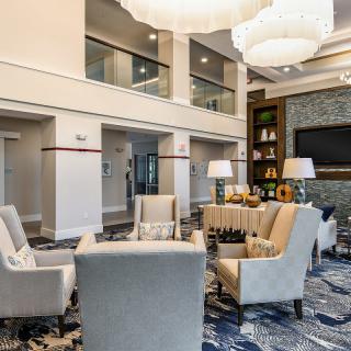 A modern lobby with elegant seating and stylish decor.