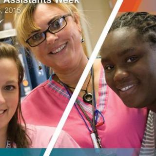 A cheerful group of healthcare professionals in a medical setting.
