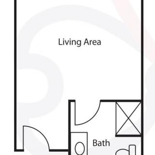 A simple floor plan of a studio apartment featuring a living area and a bathroom.