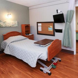 A well-equipped hospital patient room designed for comfort and accessibility.