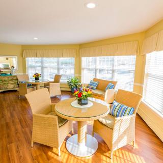 A bright and cozy living room with modern furniture and abundant natural light.