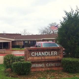 A view of the Chandler Nursing Center with its signage and building exterior.