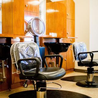 Empty salon chairs in a hairdressing studio.