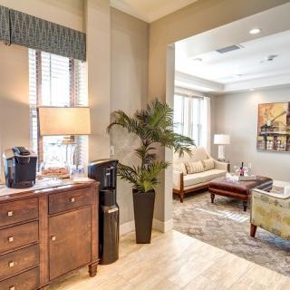 Bright and cozy living room with elegant furniture and decor.