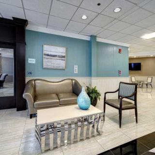 A modern lobby area featuring stylish seating and decor.