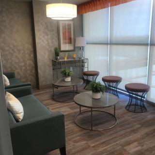 A modern waiting room with stylish seating and natural light.