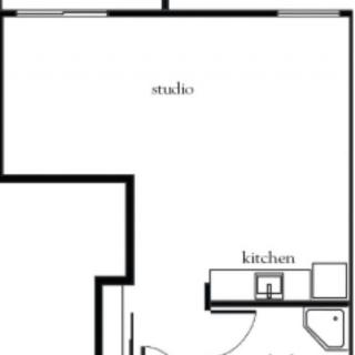A simple floor plan of a studio apartment, featuring an open layout with a kitchen area.
