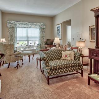 A classic living room with elegant furniture and decor.