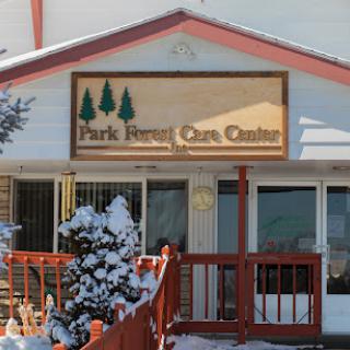 The Park Jenny Care Center, featuring a welcoming facade amidst a snowy landscape.