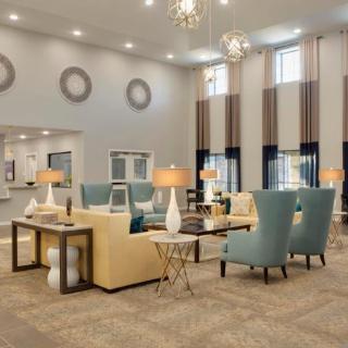 A modern living room with stylish furniture and elegant decor.