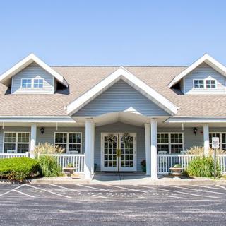 A suburban-style building with a welcoming entrance and well-maintained landscaping.