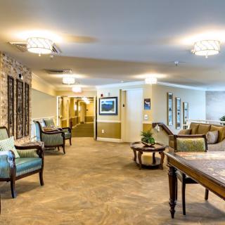A cozy modern lobby area with comfortable seating and elegant lighting.