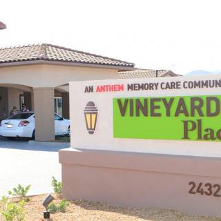 Memory care facility with a visible sign and entrance.