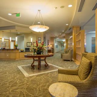 Elegant lobby with comfortable seating and warm lighting.