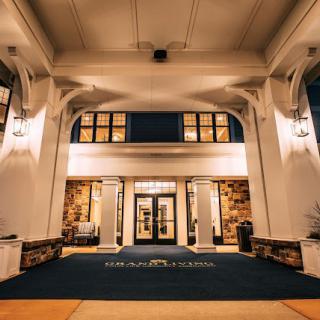 Illuminated entrance of a building at night.