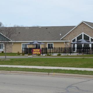 A view of a residential community center featuring modern architectural design.