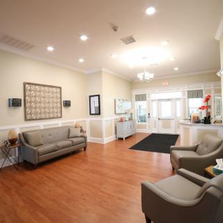 A bright and welcoming lobby area with comfortable seating and elegant decor.