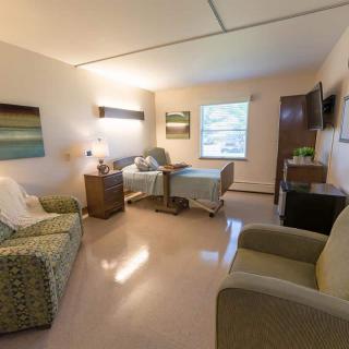 A cozy living room with comfortable seating and warm decor.