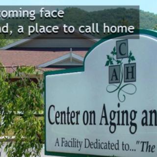 A sign for the Center on Aging and Health, emphasizing a welcoming environment.