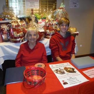 Volunteers at a holiday charity event, ready to assist with festive preparations.