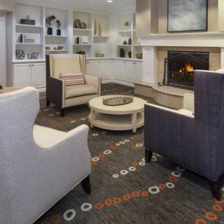 Cozy living room with a fireplace and comfortable seating.