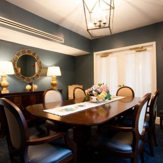 A classic dining room with elegant furniture and decor.
