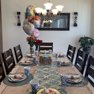 A beautifully set dining table ready for a festive gathering.