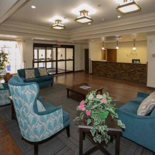 A cozy lobby with comfortable seating and a welcoming reception desk.