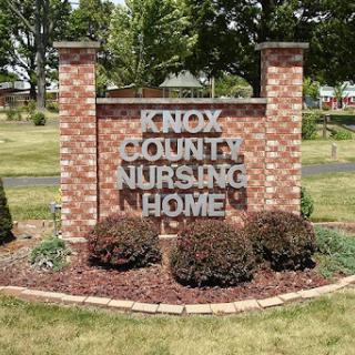 Sign of Knox County Nursing Home, surrounded by well-maintained landscaping.