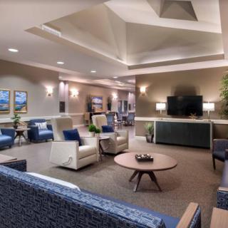 A modern lobby with comfortable seating and stylish decor.