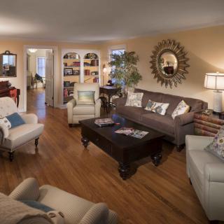A cozy and stylish living room with comfortable seating and elegant decor.
