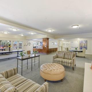 Spacious lobby with modern seating and bright lighting.
