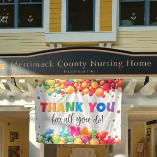 A colorful banner expressing gratitude hangs outside Merrimack County Nursing Home.