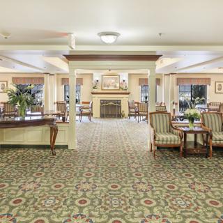 A spacious and elegantly decorated lobby area with comfortable seating arrangements.