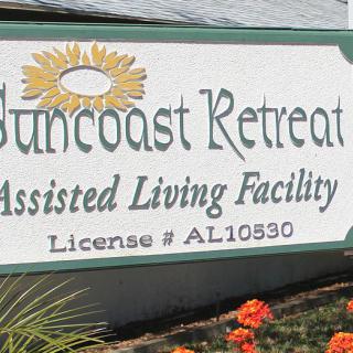 Sign for Suncoast Retreat Assisted Living Facility with License #AL10330.