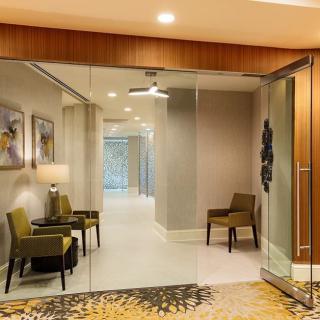 A modern lobby with stylish seating and contemporary artwork.