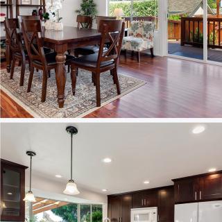 A modern open-concept dining and kitchen area with wooden furniture and flooring.