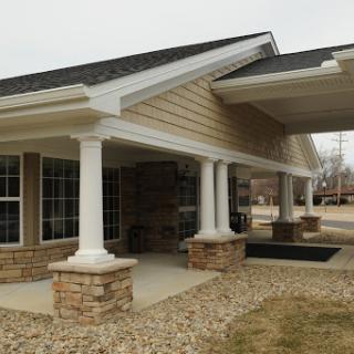 A well-designed entrance featuring decorative columns and a welcoming facade.