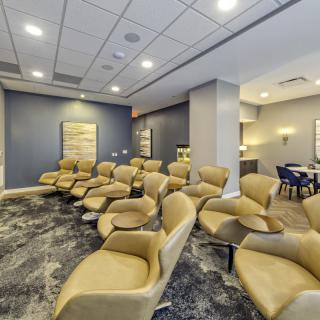 A modern conference room with comfortable seating and stylish decor.