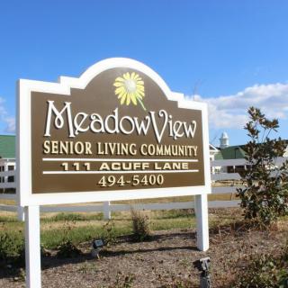 Sign for MeadowView Senior Living Community located at 111 Acure Lane.