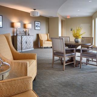 A cozy lounge area with comfortable seating and modern decor.